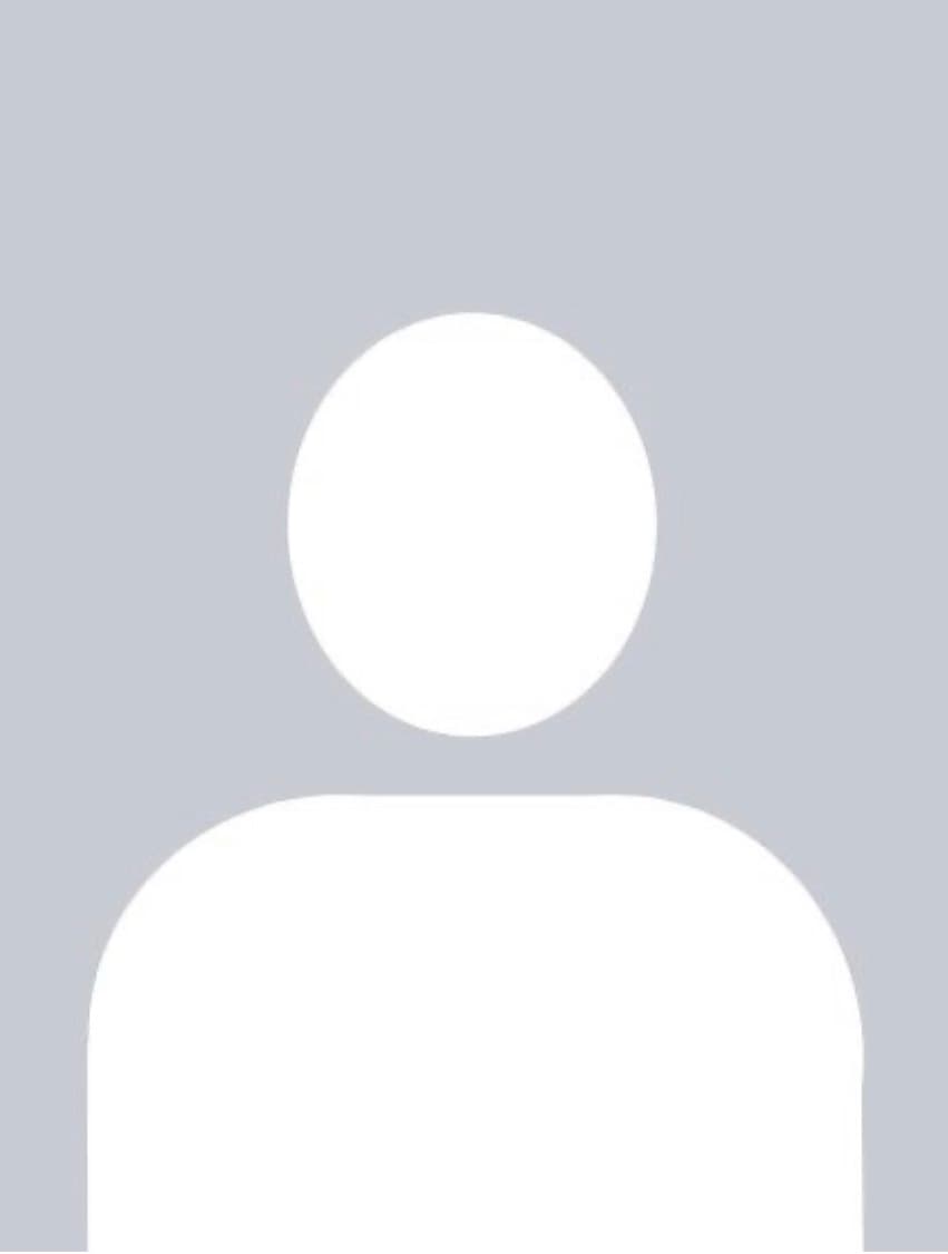 Generic white silhouette of a person's head and shoulders against a light gray background.